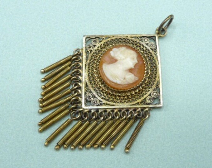 Silver pendant covered with gilding, with cameo. Vintage.