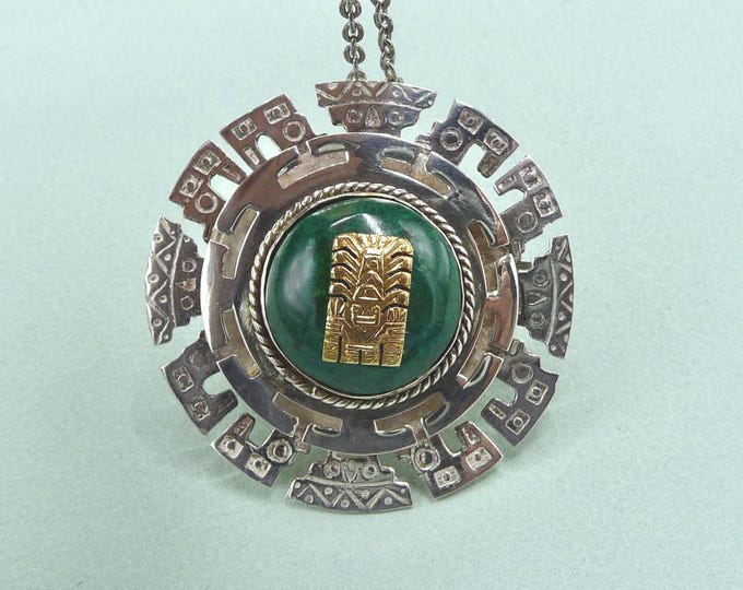 Peru. Pendant/brooch in silver, gold and green stone. Vintage.