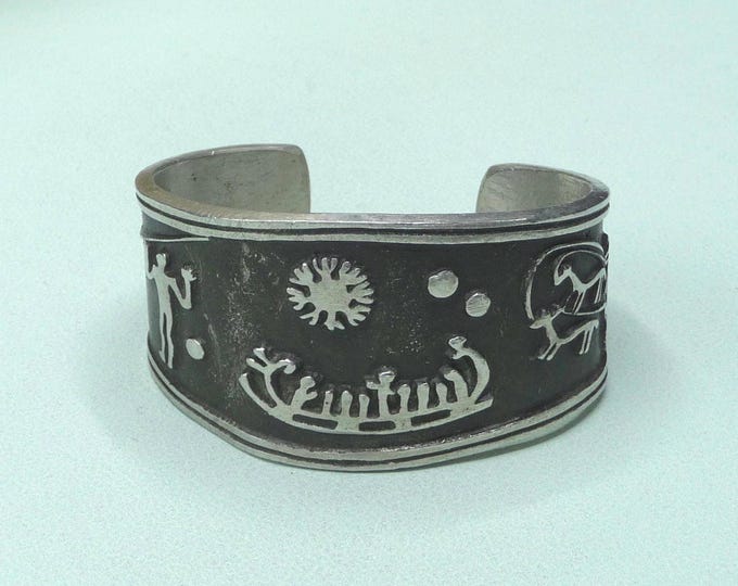 Vintage tinplate bracelet, made in Sweden.