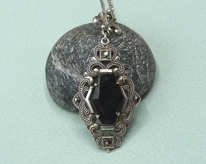 Silver and onyx pendant, made in Sweden. Vintage.