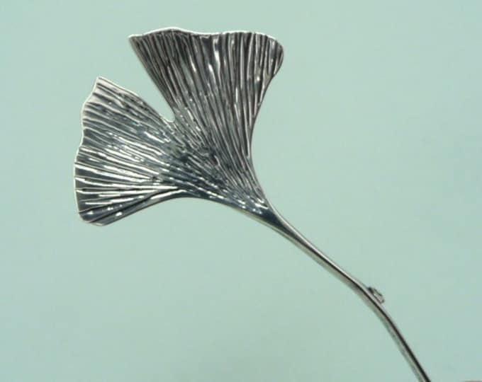 Long silver brooch. Vintage.