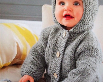 Knitted baby jacket with clearance hood