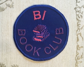 Embroidered pride iron on patch: Bi book club.