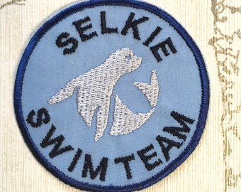 Embroidered cryptid  iron on patch: Selkie Swim Team.