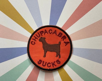 Embroidered cryptid iron on/sew on patch: Chupacabra Sucks.