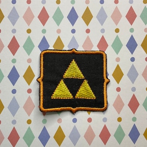 The  Legend of Zelda Triforce embroidered iron on/sew on patch.