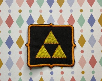 The  Legend of Zelda Triforce embroidered iron on/sew on patch.