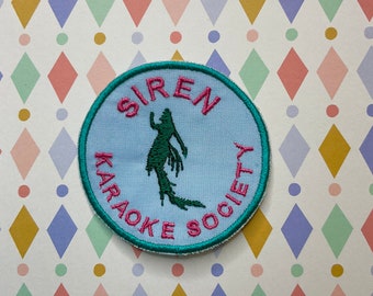 Embroidered cryptid iron on patch: Siren karaoke society.