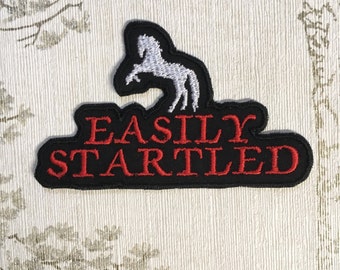 Embroidered iron on patch: Easily Startled.