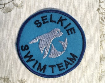 Embroidered cryptid  iron on patch: Selkie Swim Team.