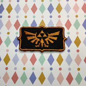 The  Legend of Zelda Crest embroidered iron on/sew on patch.