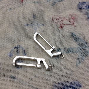 SALE--100pcs of Antique Silver saw  pendant charm Size:25mmx13mm