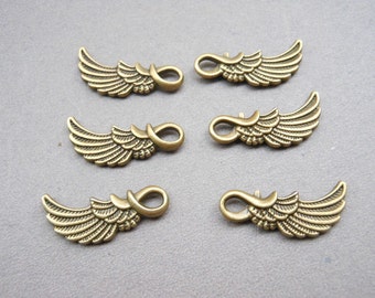 50 pcs 25x10mm of Antique Bronze wing Charms, wings of an angel .