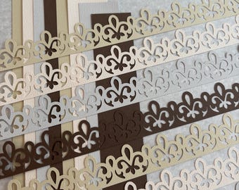 Fleur de Lis-artige Bordüre, 16 Stück, in 4 Farben, für Scrapbookseiten, Kartenherstellung und andere Papierarbeiten