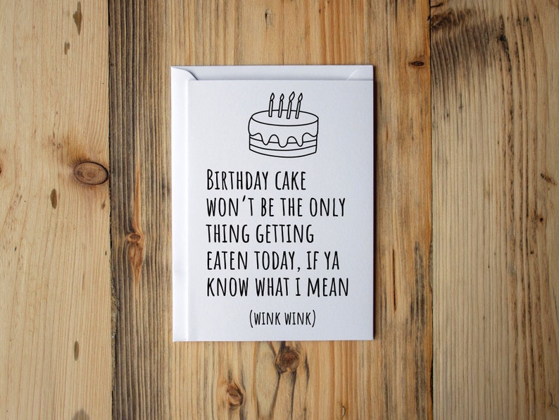 Birthday card for wife. The card has a white background with black lettering that says "Birthday cake won't be the only thing getting eaten today, if ya know what I mean (wink wink)" and has a line drawing of a birthday cake.