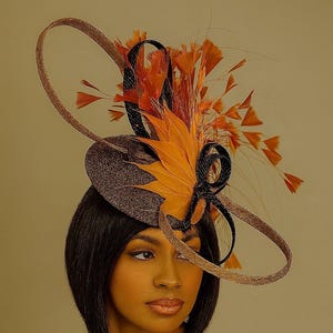 Zahara Fascinator – Dramatic Orange and Black Headpiece with Feather Spray & Loops | Statement Hat for Weddings, Races and  Church.
