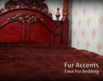 May include: A close-up of a dark brown faux fur bedspread on a wooden bed frame. The bedspread has a quilted pattern and the text "Fur Accents Faux Fur Bedding" is visible in the lower right corner.
