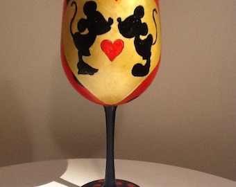 Kissing Mickey and Minnie hand painted  wine glassEnjoy your favorite wine in our new 19 ounce white wine glass