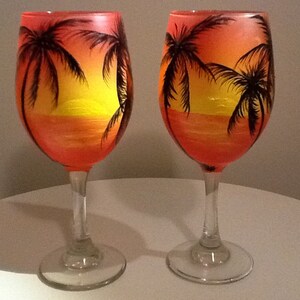 Sunset with palm trees wine glass, 16.95 each glass, Enjoy your favorite wine in our new 19 oz. wine glass, price is for one glass