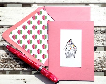 Cupcake stamped embossed & embellished on light pink blank card and coordinating lined envelope.  Set of 10 cards + lined envelopes.