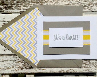 Party invitation with yellow and white grosgrain ribbon and silver stamp. White card with Gravel envelope. Set of 6 invites and envelopes.