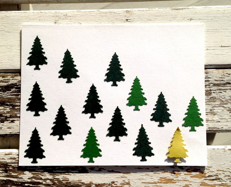 Paper Punched Pine Trees in Shades of Green on a White Note Card With a