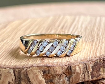 Gold CZ ring. A 9K yellow gold cubic geometric style ring.