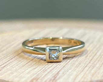 Gold diamond ring. 1/10 Carat Princess cut diamond in a 9K yellow gold solitaire ring.