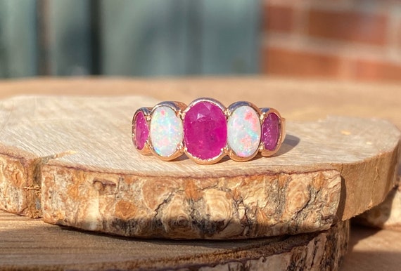 Gold ruby opal ring. This 9K rose gold ring has n… - image 1