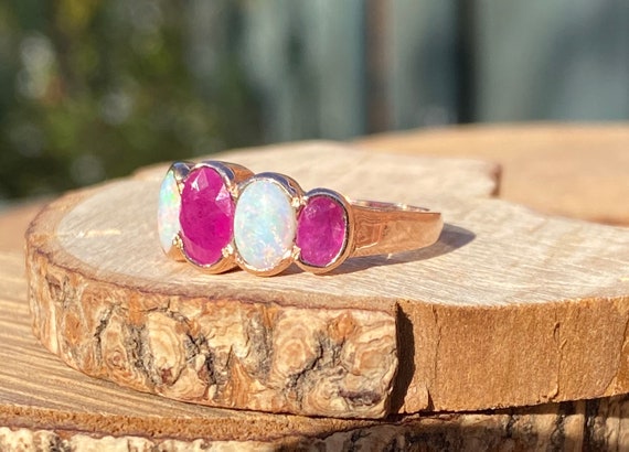 Gold ruby opal ring. This 9K rose gold ring has n… - image 3