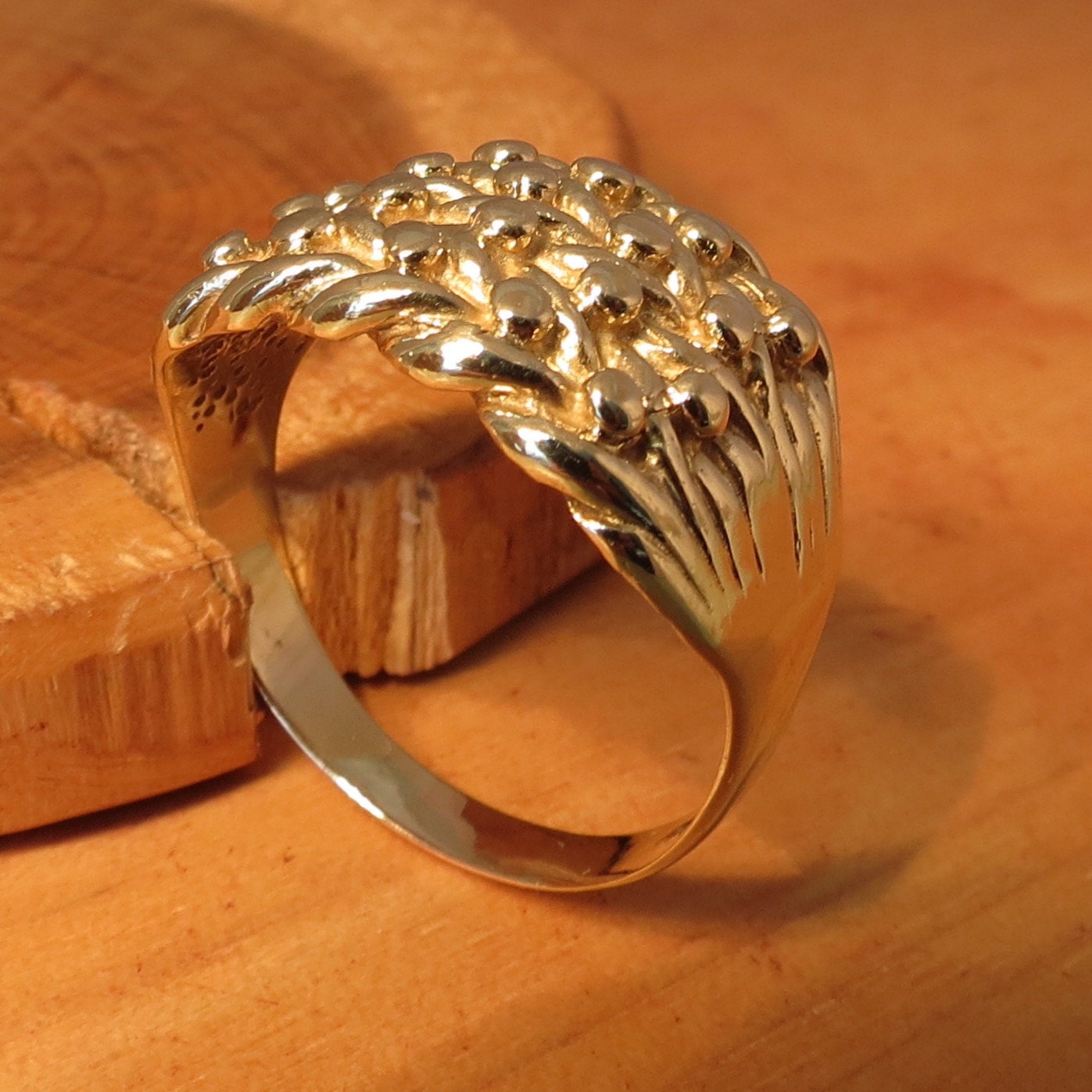 An English  vintage 9K yellow gold  Keeper ring 