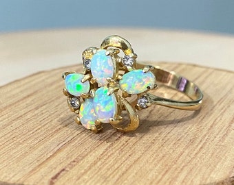 Gold opal ring. 9K yellow gold diamond and opal ring.