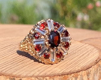 Gold garnet ring. Vintage ornate 9k yellow gold red garnet and white topaz ring.