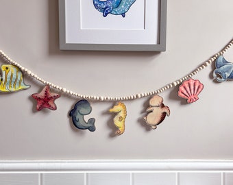 Wooden sea animals garland, nursery decor featuring colourful under the sea creatures.