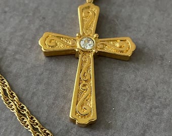 Celtic style gold tone rhinestone cross necklace