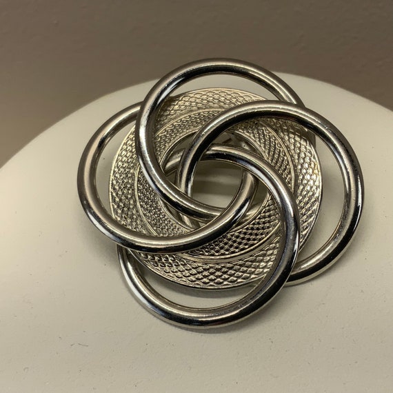 Swirling interlocking loop joint brooch in silver… - image 3