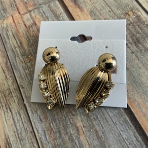 Vintage gold tone rhinestone leaf clip on earrings from the 60s