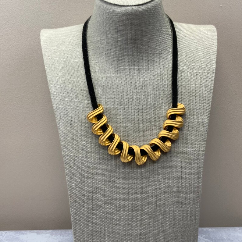 Vintage matte gold woven choker necklace on black suede cord