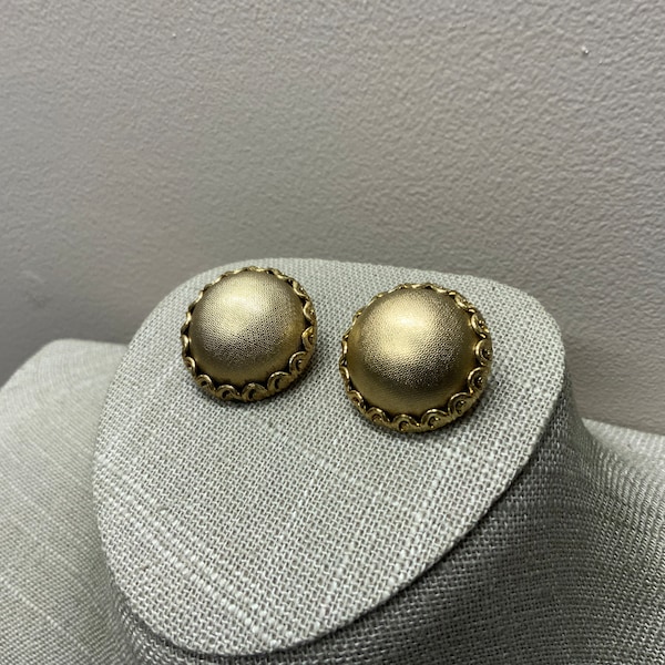 Textured domed filigree clip on earrings signed Whiting and Davis in gold tone