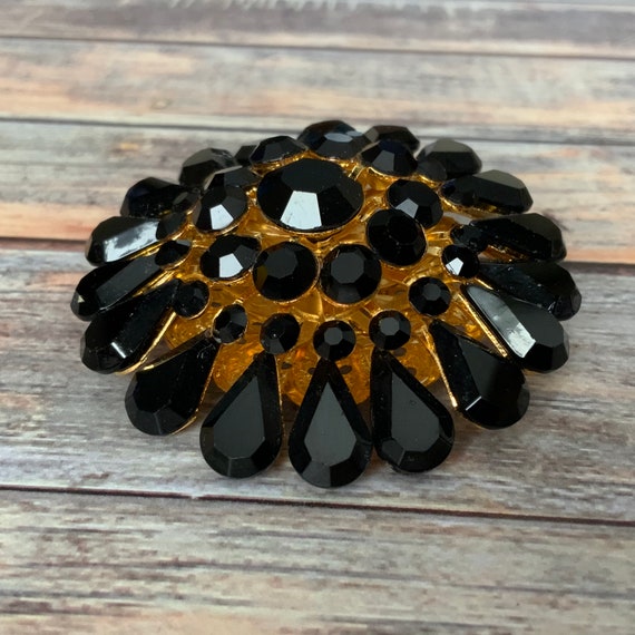 Domed gold tone filigree black rhinestone flower … - image 1