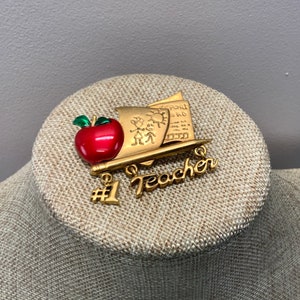 Vintage matte gold Danecraft #1 teacher brooch