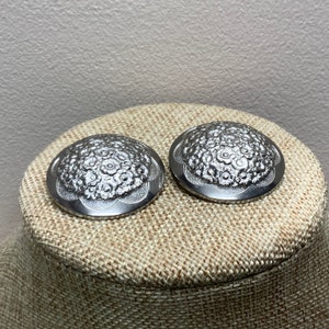 Large silver tone domed daisy flower clip on earrings