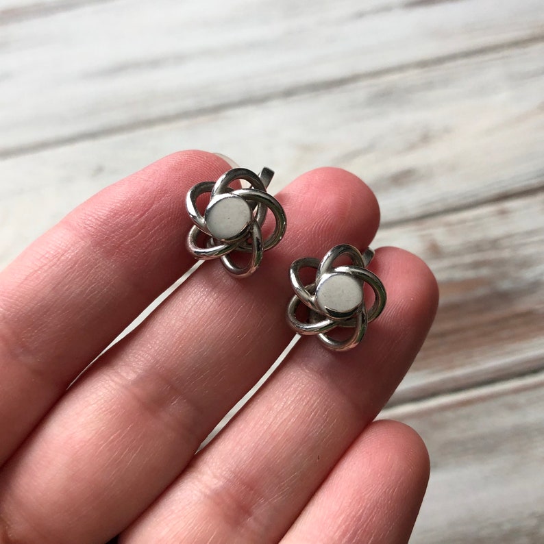 Small lot of silver tone metal screw back earrings knot earrings rhinestone and heart screw back earrings