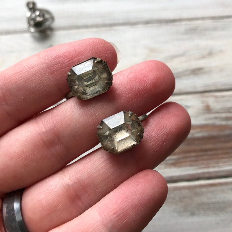 Small lot of silver tone metal screw back earrings knot earrings rhinestone and heart screw back earrings