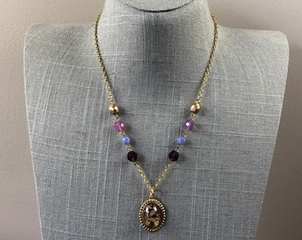 Glass faux opal purple and pink beaded necklace in gold tone metal