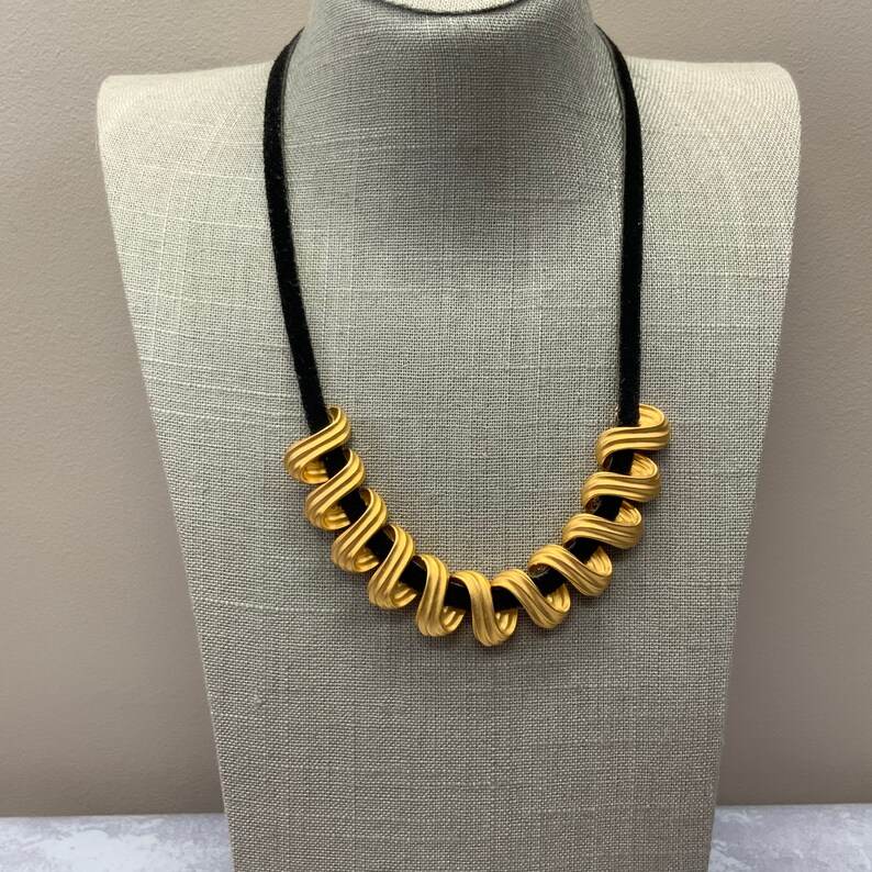 Vintage matte gold woven choker necklace on black suede cord