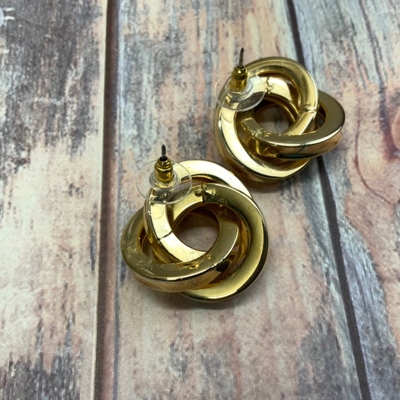 Pierced chunky gold interlocking knot earrings - image 2