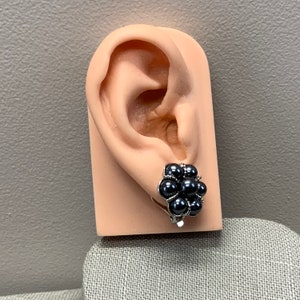 Dark gray faux pearl clip on earrings in silver tone metal