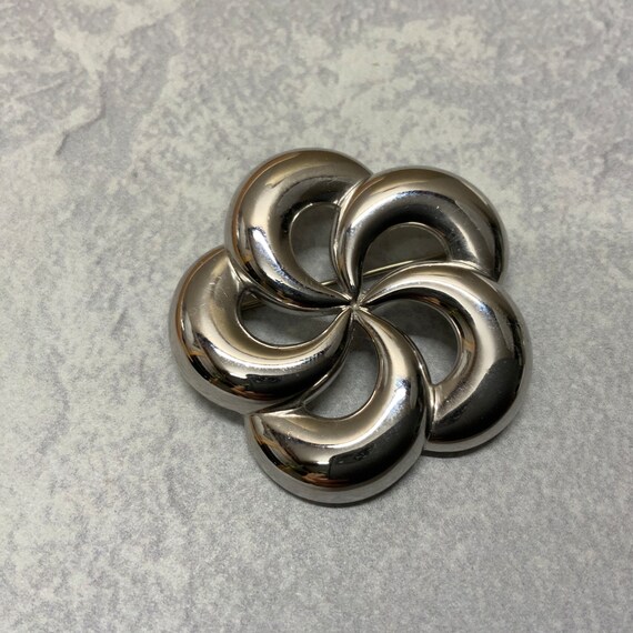 Vintage polished silver tone MONET floral pin whe… - image 1