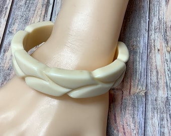 Vintage cream carved lucite bangle bracelet from the 70s